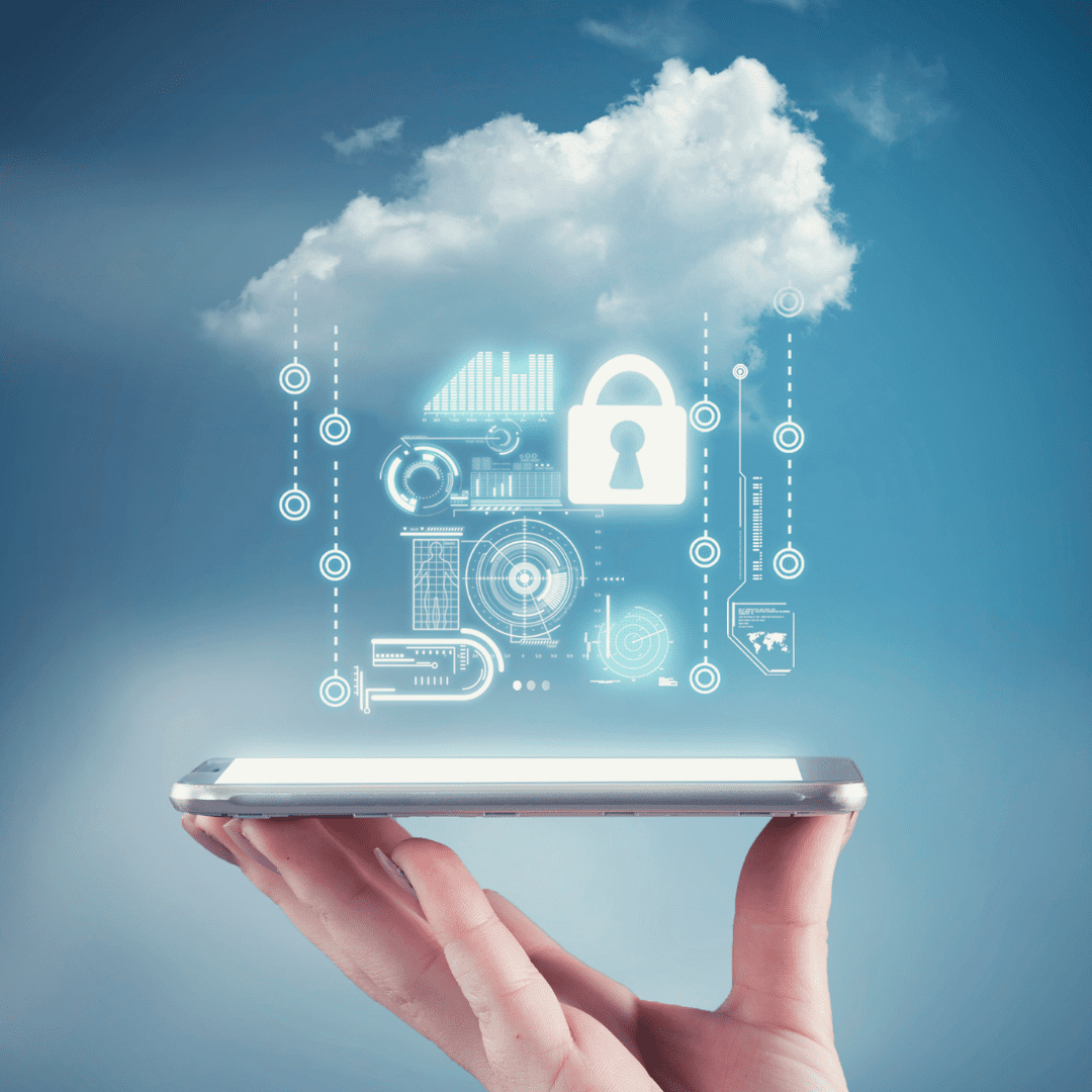 Trustack MSP Cyber Security, IT Services, IT Support. A hand holds a smartphone with a digital cloud hovering above it, symbolizing Microsoft Azure cloud migration. The cloud features various tech symbols like graphs, a lock, and circuit designs against the backdrop of a bright blue sky.