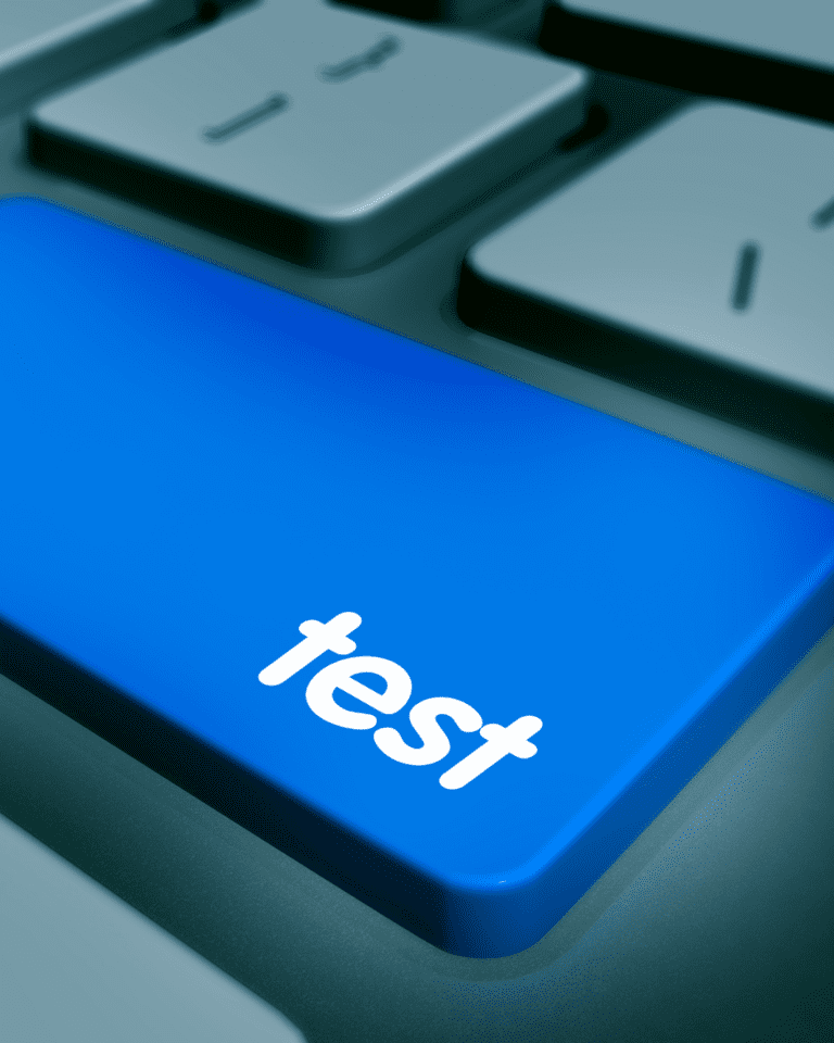 Trustack MSP Cyber Security, IT Services, IT Support. Close-up of a keyboard highlighted by a prominent blue key labeled "test" in white letters, surrounded by standard gray keys. This striking image symbolizes how artificial intelligence can revolutionize your business and enhance cybersecurity, with the "test" key capturing full attention.