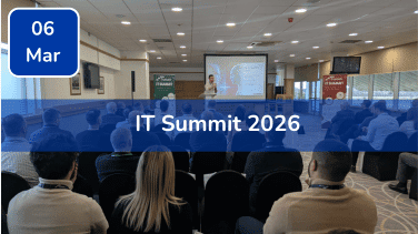 Trustack MSP Cyber Security, IT Services, IT Support. A speaker presents to an audience in a conference room with a projector screen displaying slides. Text overlay reads "IT Summit 2026," "06 Mar" in a blue box, and highlights Trustack's Upcoming Events not to miss.